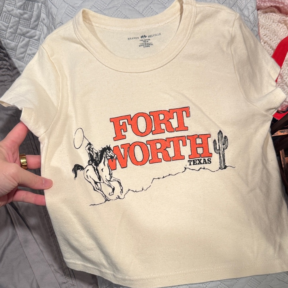 Brandy Melville Cream Graphic Tee with Orange 'Fort Worth' Print